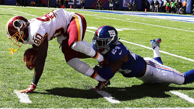 eli-apple-annie-apple-giants-redskins.jpg